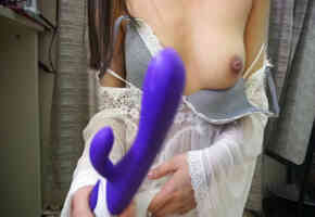 Beautiful milk young woman with purple eggplant props stuffed into her pussy...